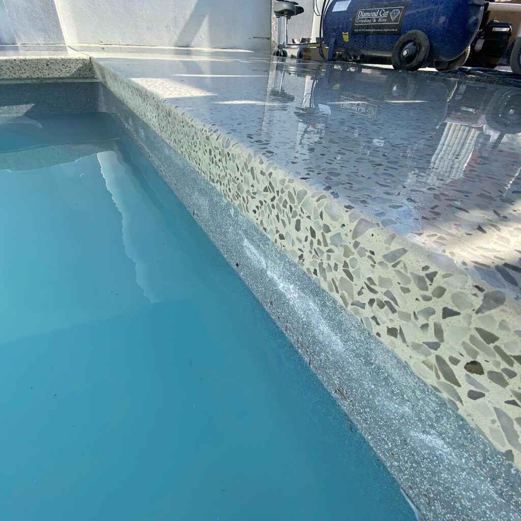 Honed Aggregate around Pool